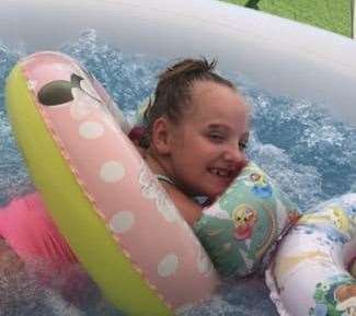 Hannah Taylor, 8, has cerebral palsy and he hydrotherapy pool was stolen from her home in Dartford over night. (15963559)