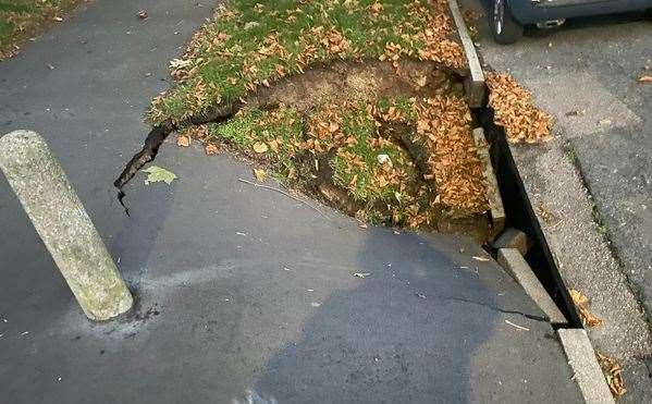 The hole is around 3ft at its deepest point near the road. Picture: John Kane