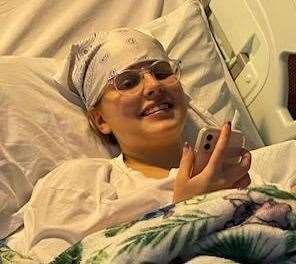 Evie Dove in hospital as she battled a brain tumour