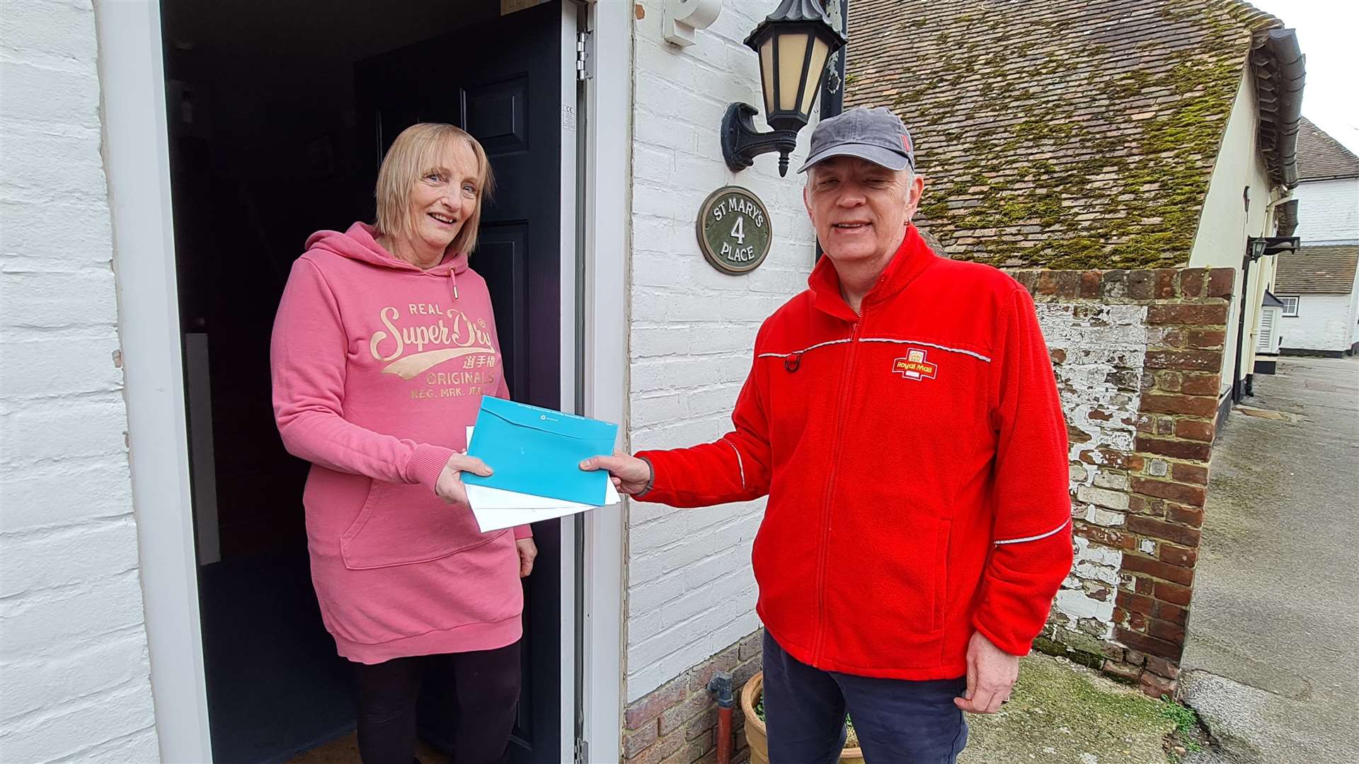 Neal delivering post to Liz Chittim in Wingham