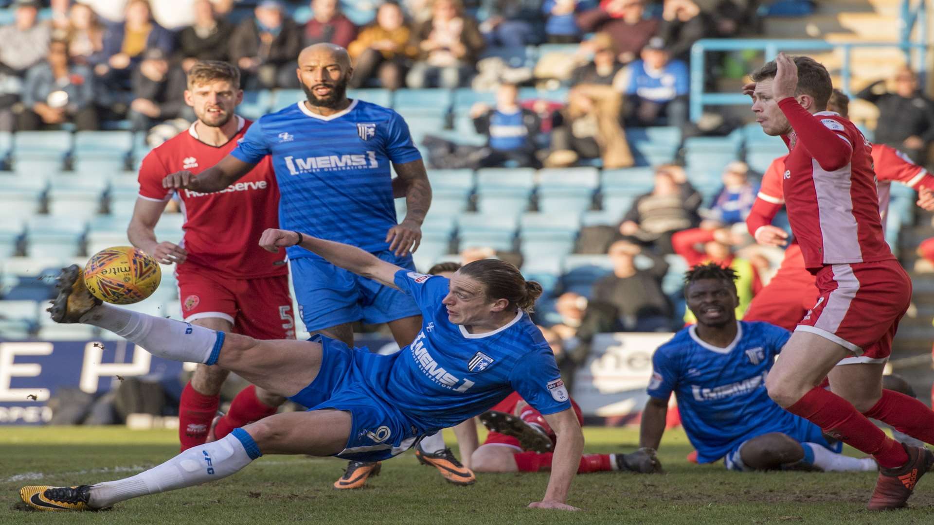 Tom Eaves tries to connect as Gills go on the attack Picture: Andy Payton