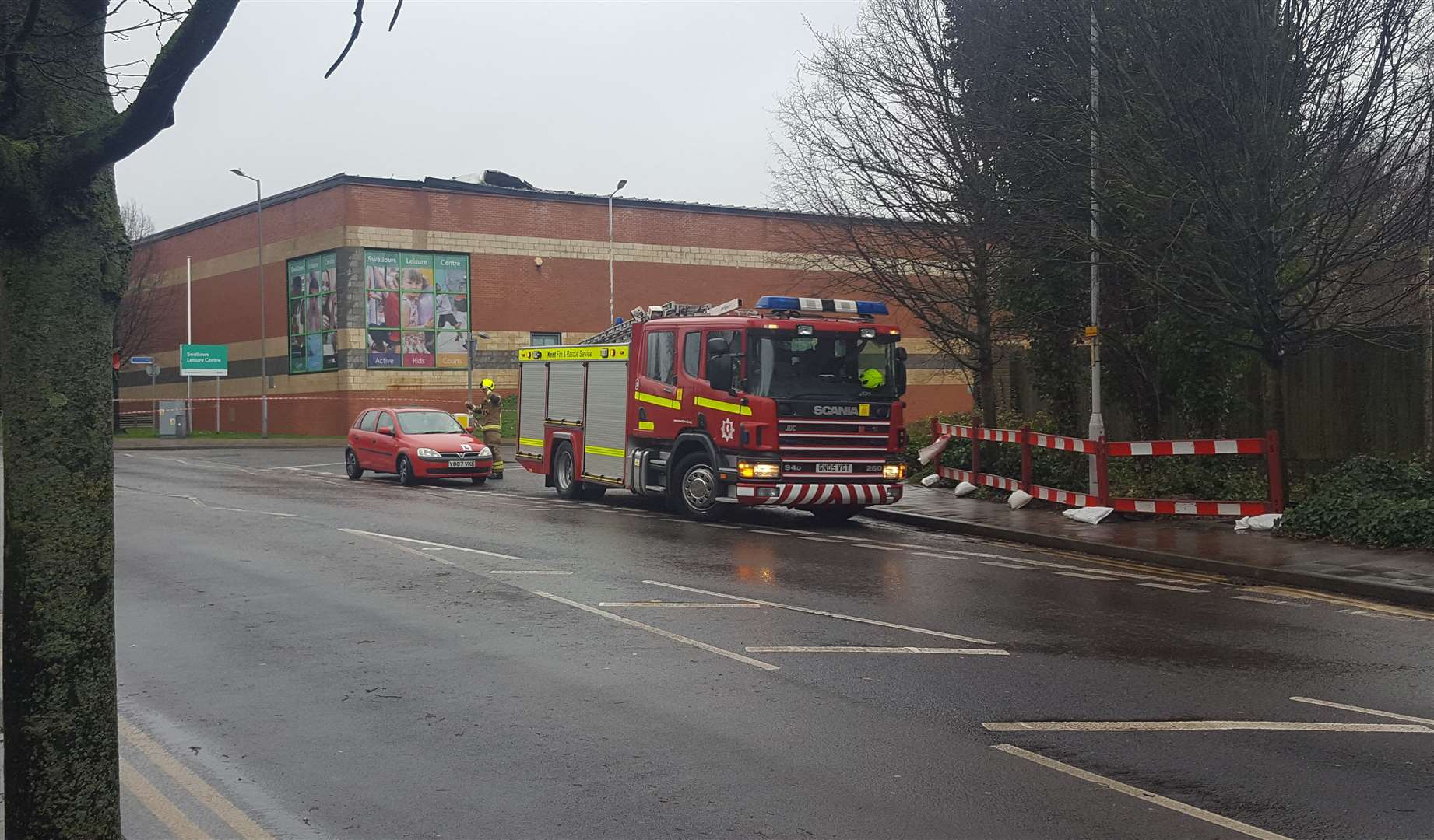 Firefighters cordoned off the area around The Swallows leisure centre after the storm damaged the roof