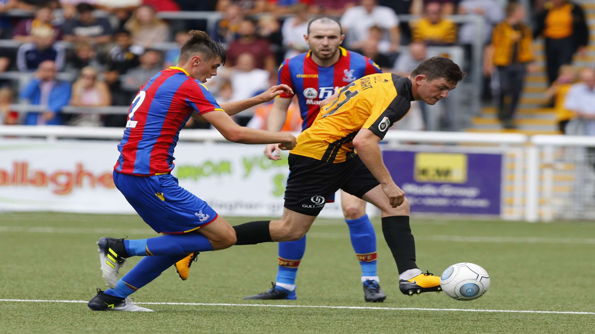 Action from Maidstone v Crystal Palace with Tom Wraight on the ball Picture: Andy Jones