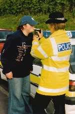 Roadside breath testing. Picture posed by models