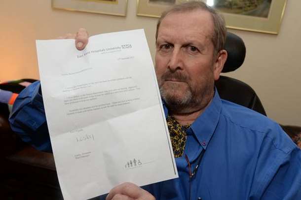 Mr Hansell with his letter of apology blaming boiler failure