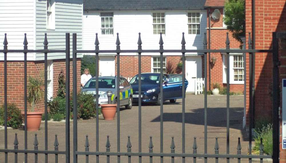 Police carrying out investigation inside the gated community