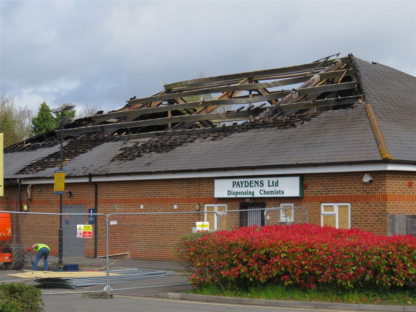 The badly damaged roof of the fire-damaged Tesco Express store Picture: Andy Clark