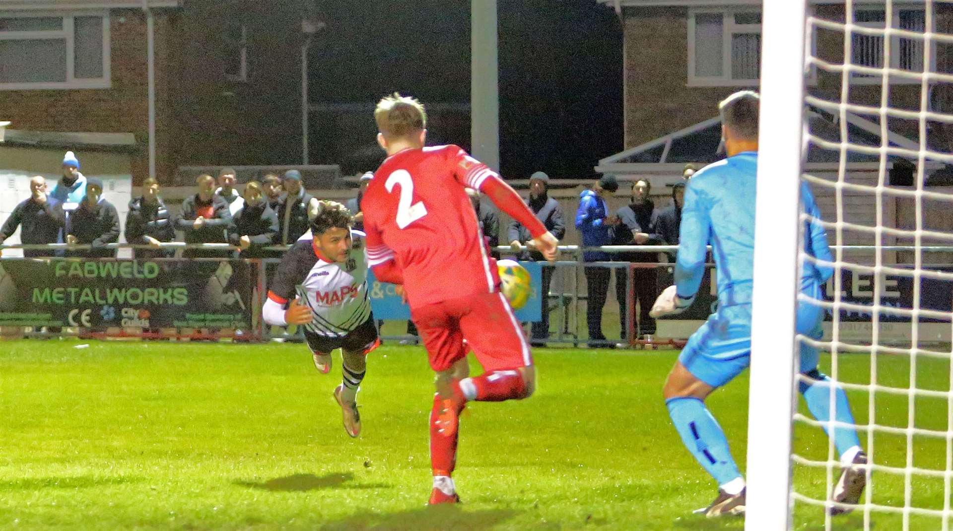 Jack Penny's flying header puts Deal Town 2-1 up against Whitstable Town. Picture: Paul Willmott