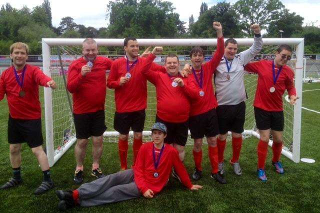 East Kent Mencap's Swale Spiders team celebrating after coming second in the Kent Disability League