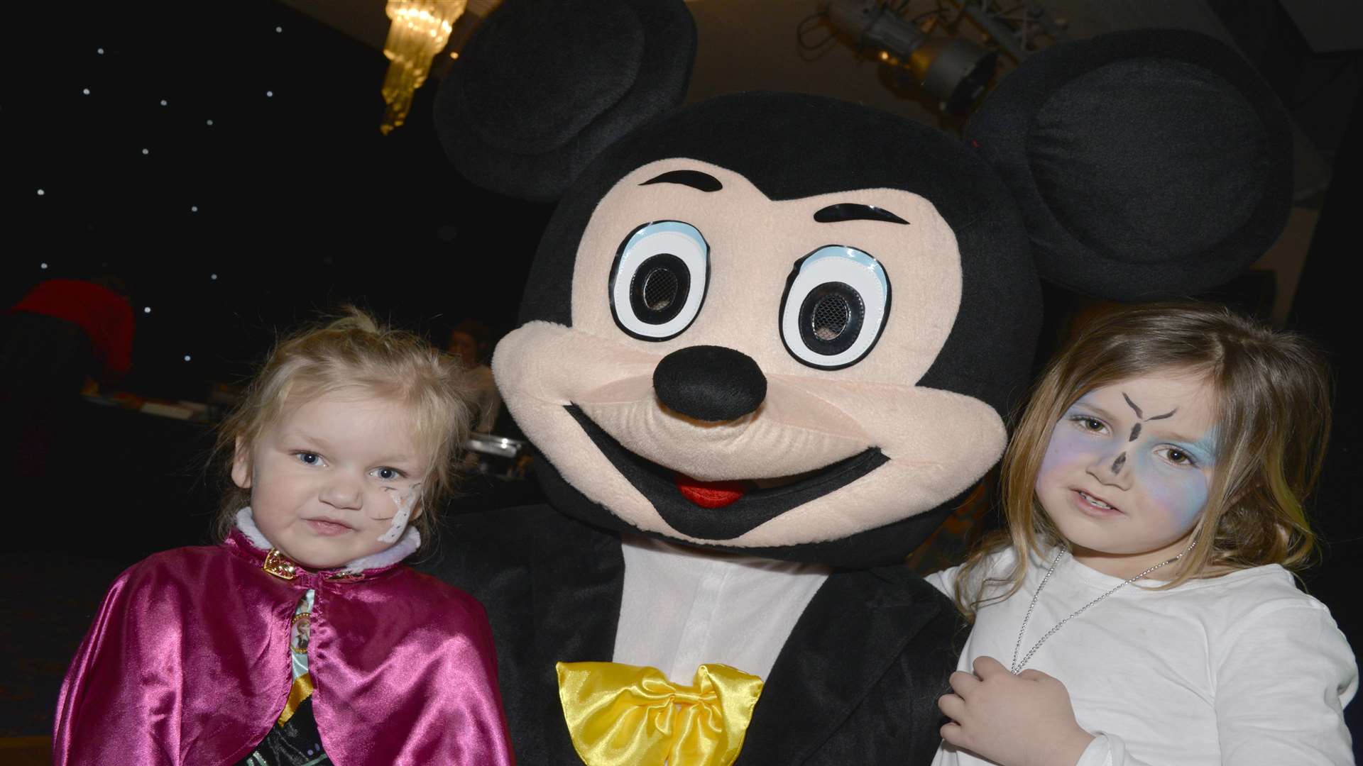 Mary,3, and Amilie, 5, with Mickey Mouse