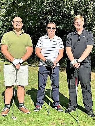 Golfers Adam Kent, left, Matt Hazledine, right, and the tournament winner Nick Hames centre