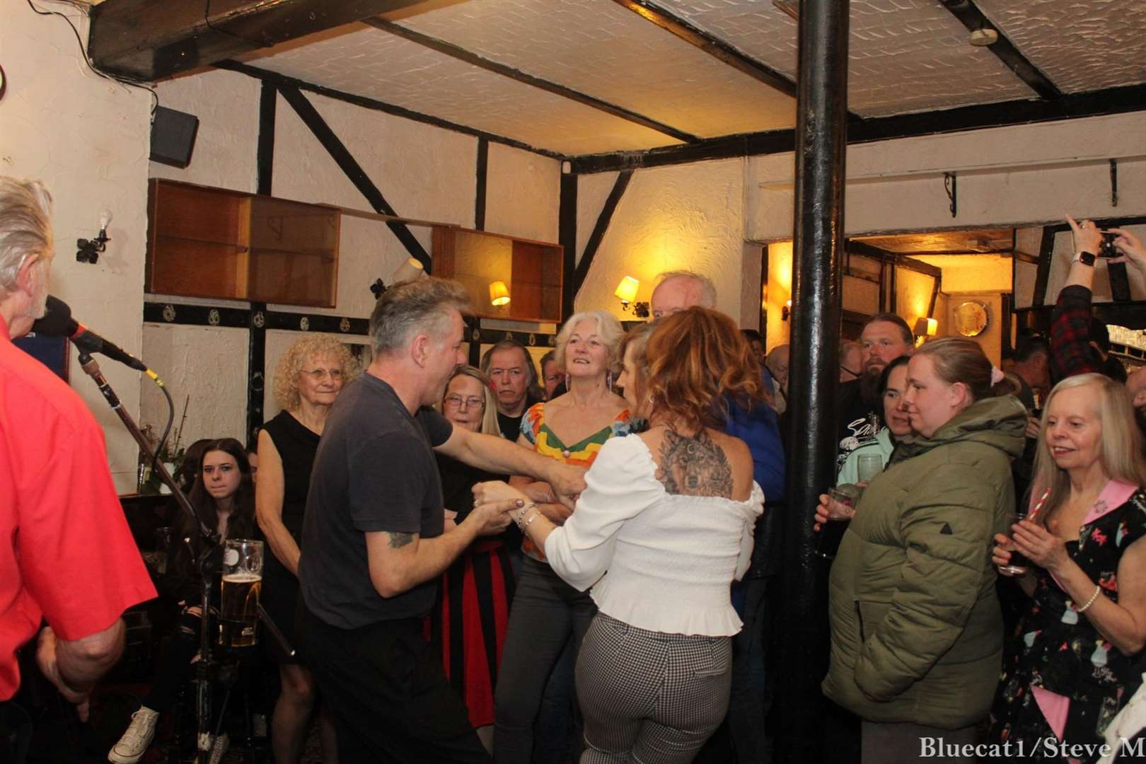 Guests danced as band Rockhouse performed on the Prince of Wales pub's closing night. Picture: Steve Mullane