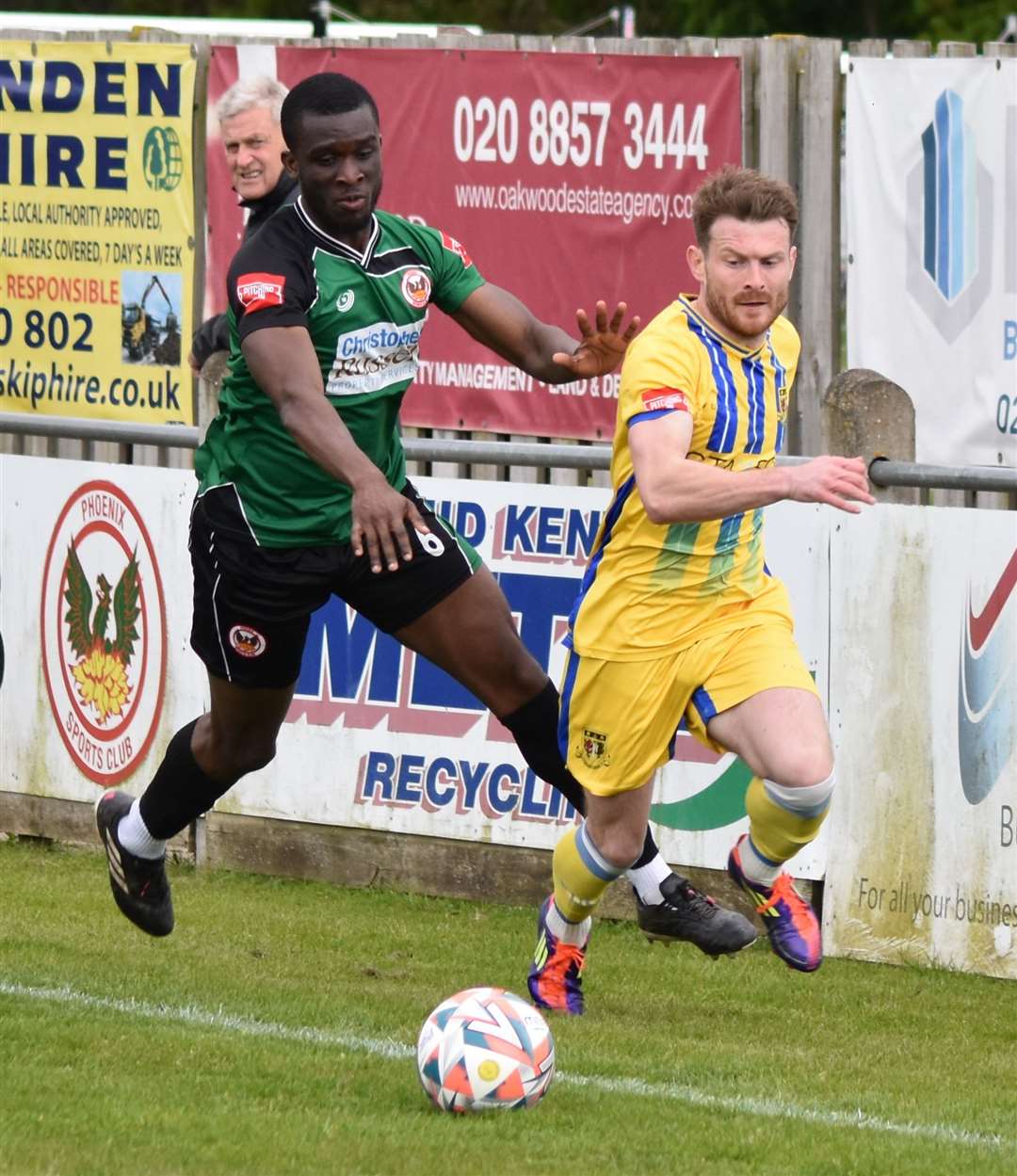 Gabby Piorkowski gets away from Adejola Lahan during Sittingbourne's win at Phoenix. Picture: Alan Coomes