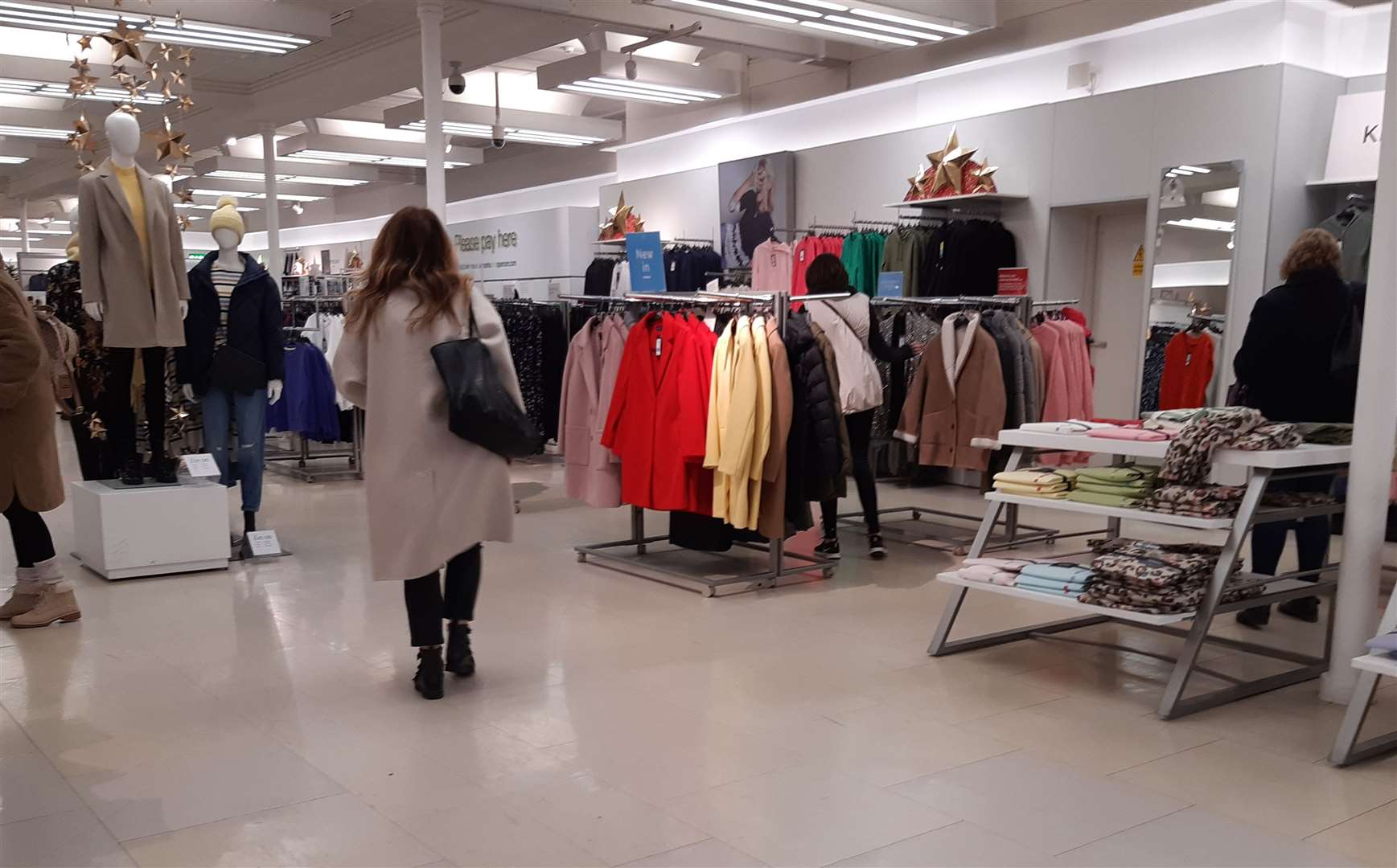 Shoppers in the M&S Week Street store, set to close on January 8