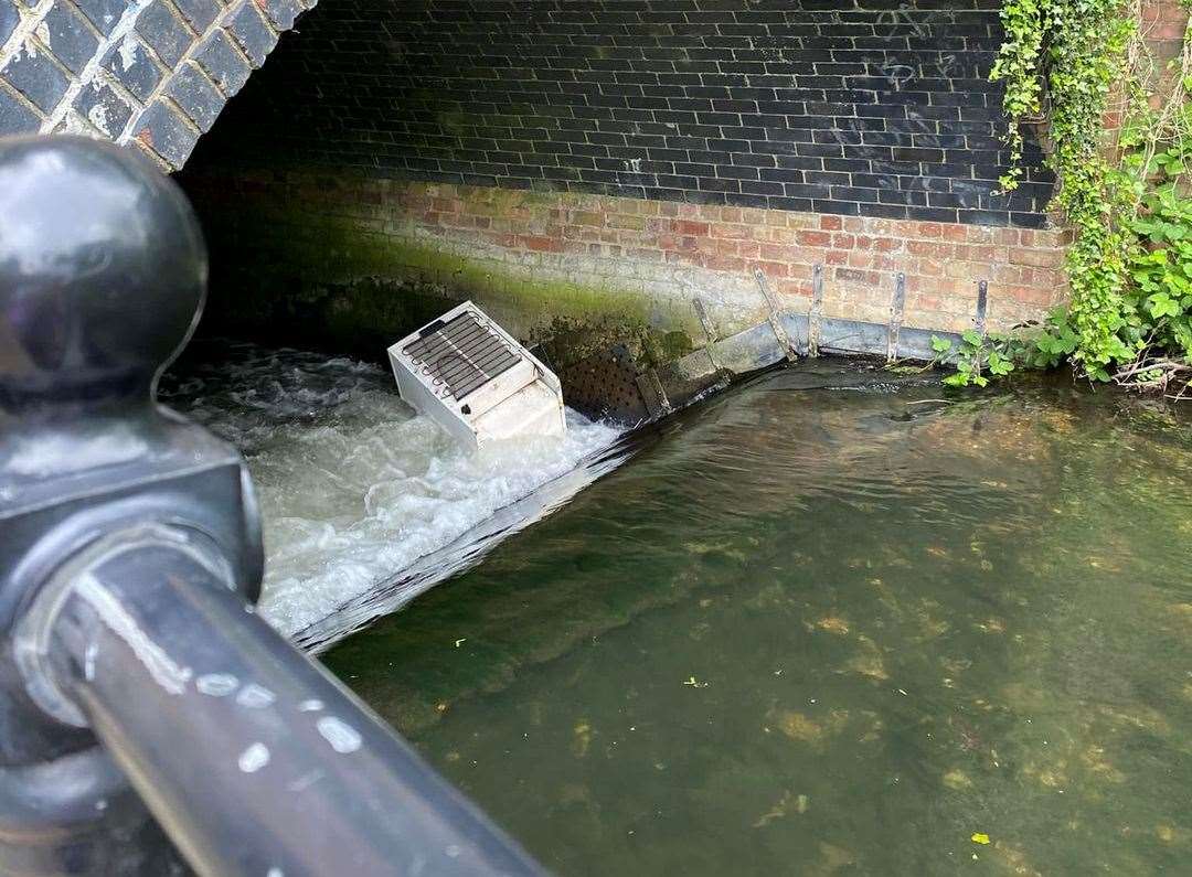Julia Hall noticed what appears to be a fridge or small freezer dumped in a river in Dartford this morning
