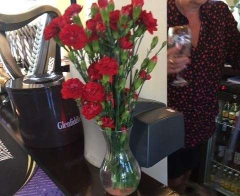 Quite a nice touch to have a vase of fresh carnations on the bar