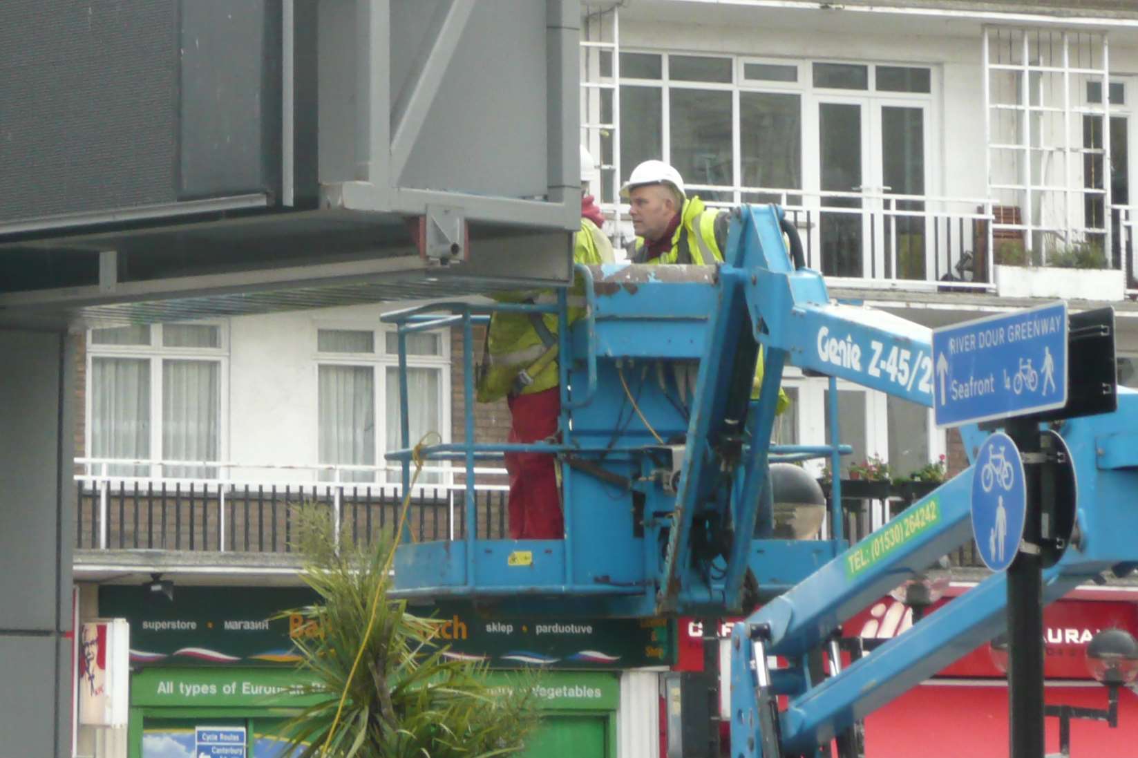 Workmen dismantling the Big Screen in Dover's Market Square.