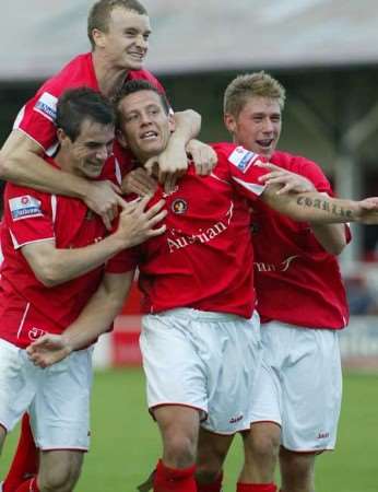 MATCHWINNER: Charlie MacDonald celebrates the only goal with team-mates. Picture: PETER STILL