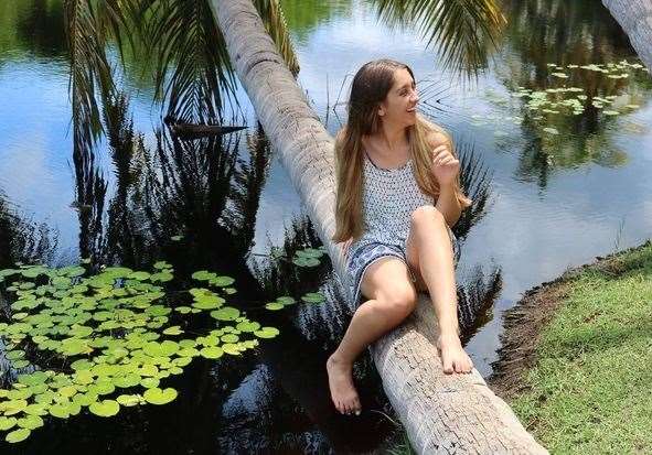 Isabella on a palm tree in Grand Cayman Botanical Gardens just before starting at the University of Kent, in summer 2017. Picture: Abigail Goddard