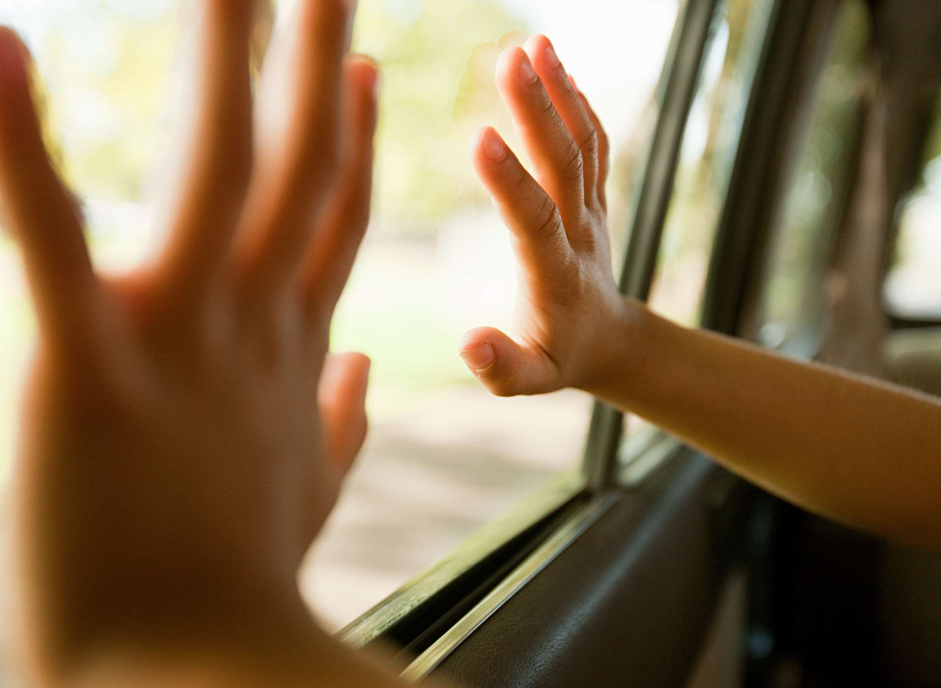 A woman claims she saw children unattended in a car. Stock image.