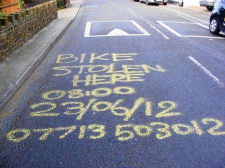 Stolen bike message spray painted on Station Road, Rainham