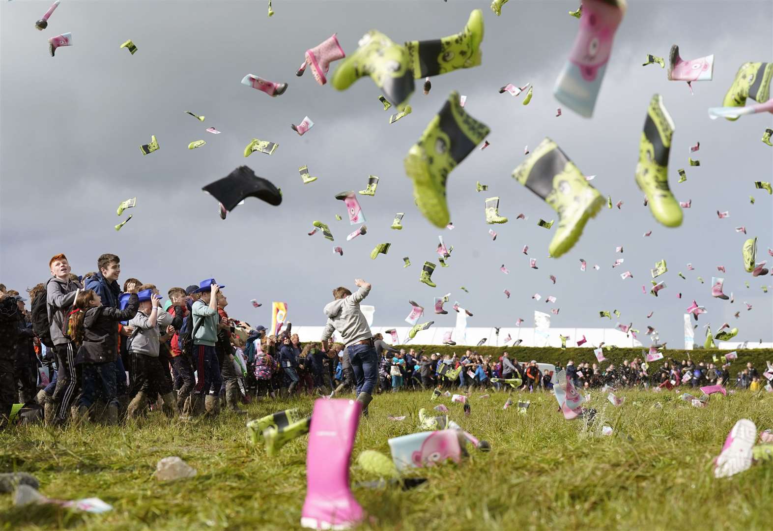 Some 995 people take part in a world record bid – the most people throwing wellies – at the National Ploughing Championships in Co Laois in September (PA)
