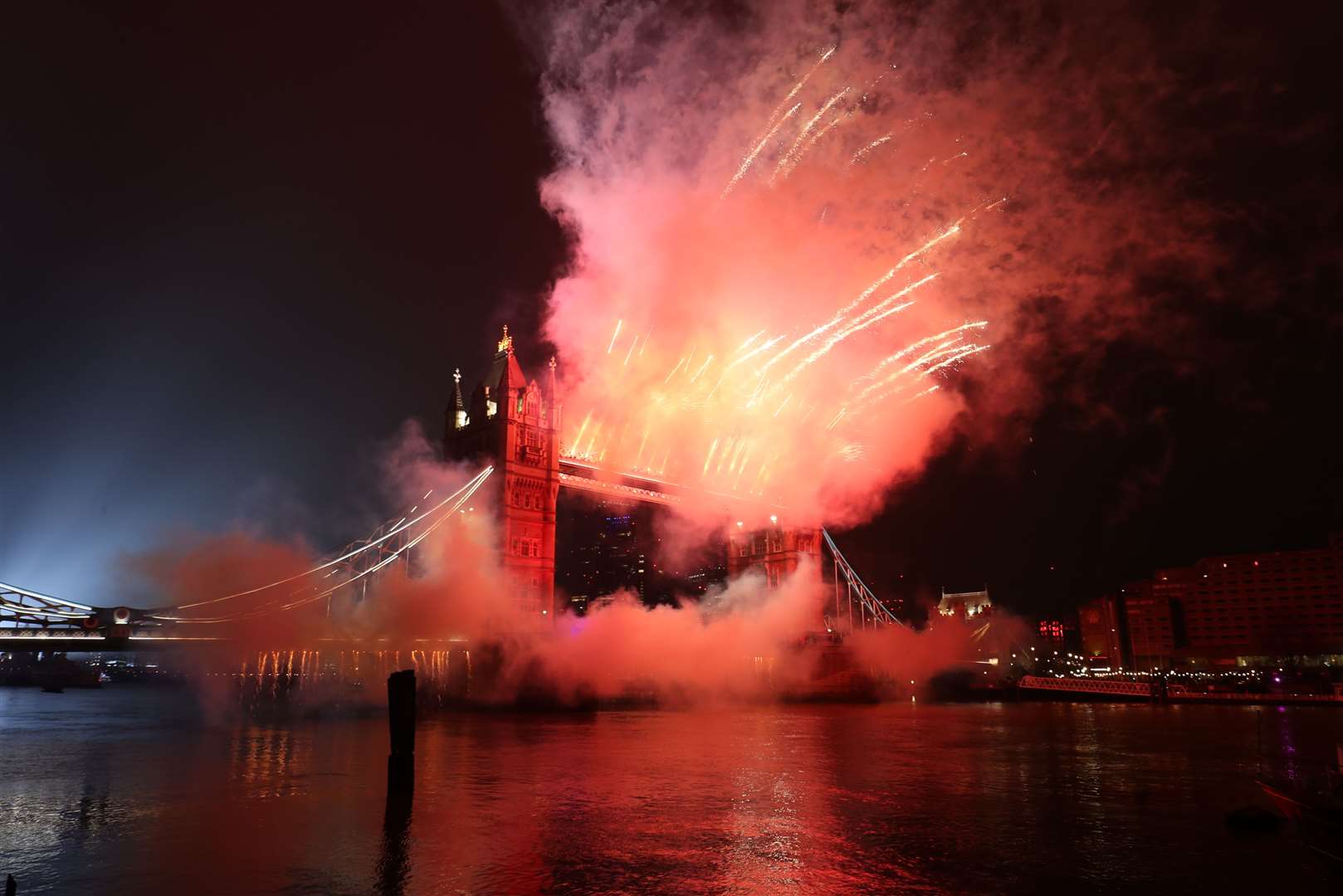 Fireworks erupt from Tower Bridge (Jonathan Brady/PA)