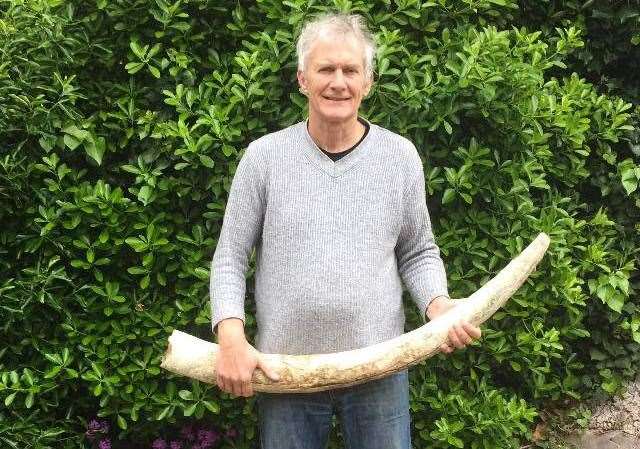 Ken Murphy doesn't know what to do with the tusk he found in Broadstairs. Picture: Ken Murphy