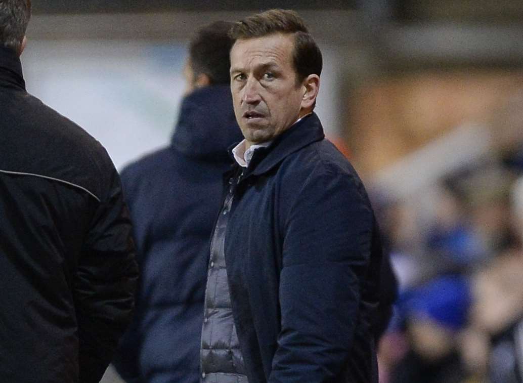 Gillingham manager Justin Edinburgh watches on at Peterborough Picture: Ady Kerry