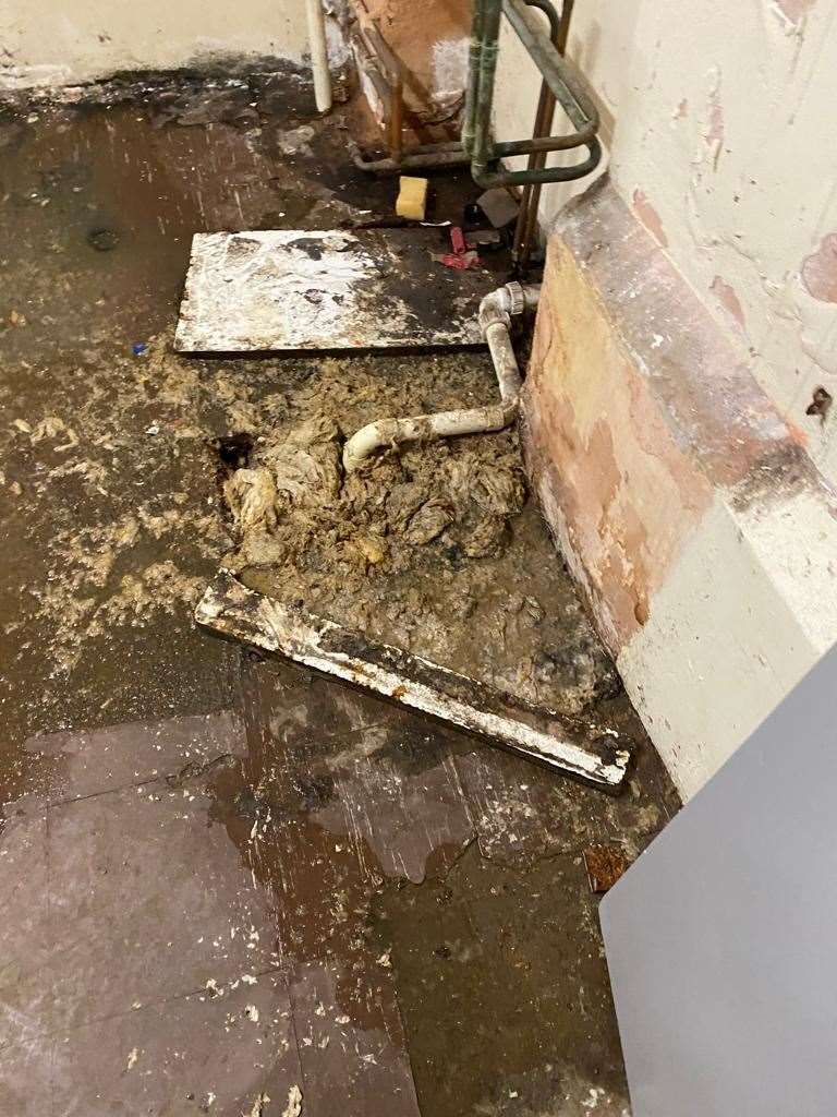 Human waste and sewage leaked into the kitchen of the Amazon hair salon in Bearsted, near Maidstone. Picture: Neal Metcalf