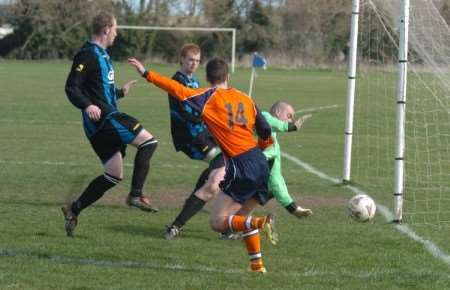 Milton keeper Nick Brown thwarts this late attack from Holm Sports in the Division 1 clash