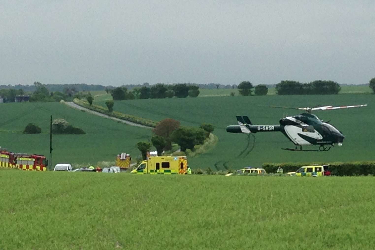 The air ambulance taking off from the scene of this morning's crash at Adisham Road.