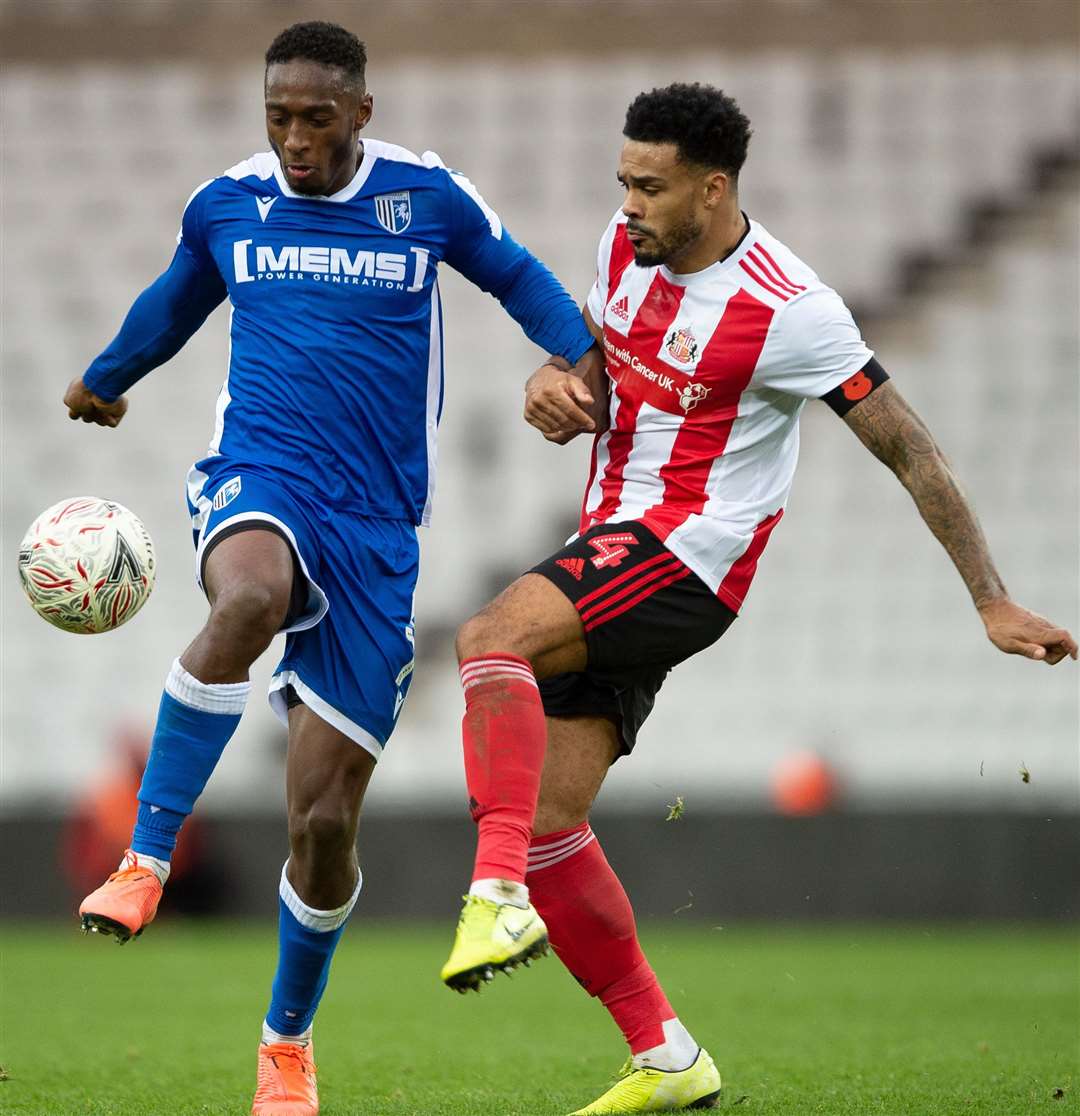 Brandon Hanlan challenges with Jordan Willis in the sides' first meeting at the Stadium of Light Picture: Ady Kerry