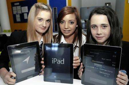 Demi Donovan (15) Georgia Wootten (16) and Danielle Golding (12) with their iPads at the Spires Academy.