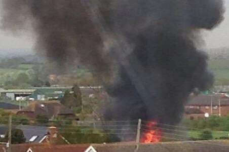 Smoke billows into the sky from a burning shed in Yorkletts where a man was discovered dead. Picture: Sonja Weed