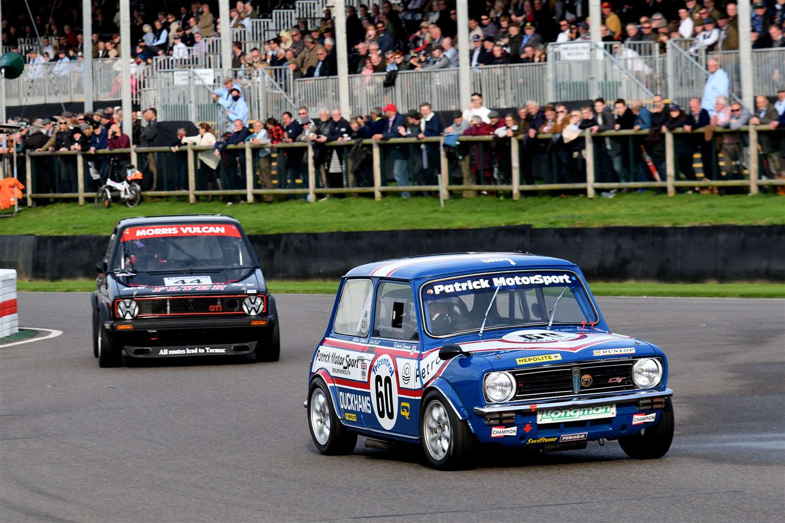 Nick Swift (60), from Tenterden, had to retire after two laps in the lead, in heat one of the Gerry Marshall Trophy race, in his Mini 1275 GT. Picture: Simon Hildrew (52524991)