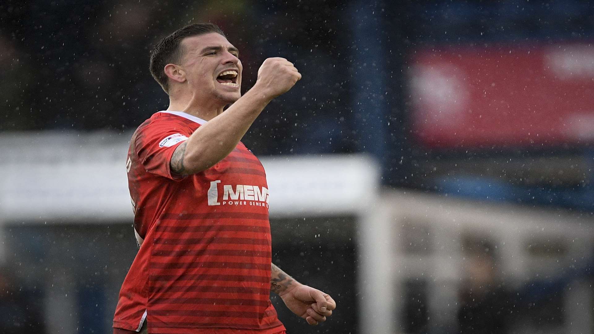 Cody McDonald celebrates after his goal proved to be the winner against Bury at Gigg Lane. Picture: Ady Kerry