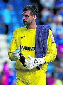 Gills keeper Ross Flitney was dejected after the final whistle after giving away the crucial penalty.