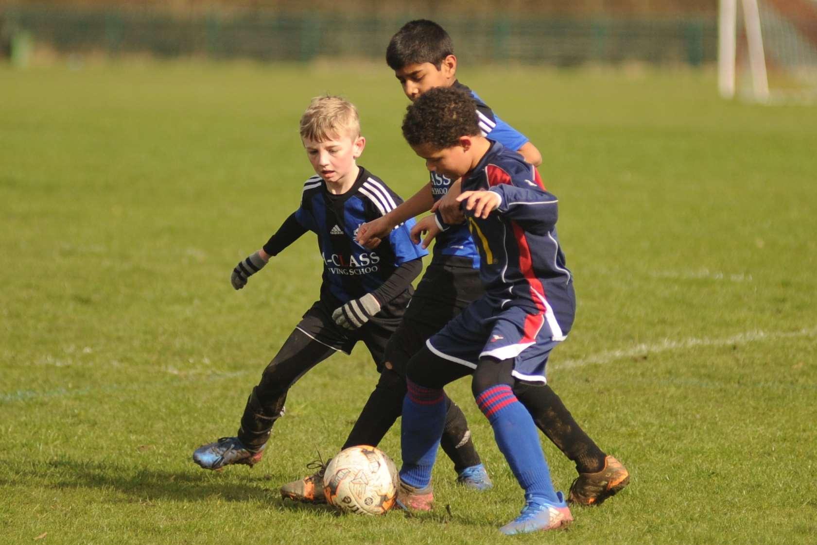 Omega 92 and Woodpecker HI under-10s battle it out Picture: Steve Crispe