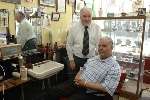 Barber Tom Maguire who has dedicated 44 years to a Gravesend barber shop