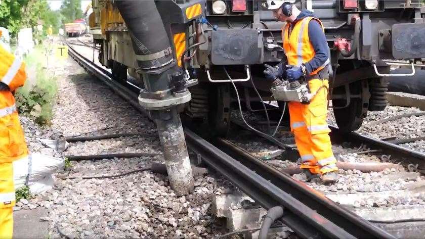 A RailVac is used to clear mud beneath the tracks. Picture @NetworkRailSE