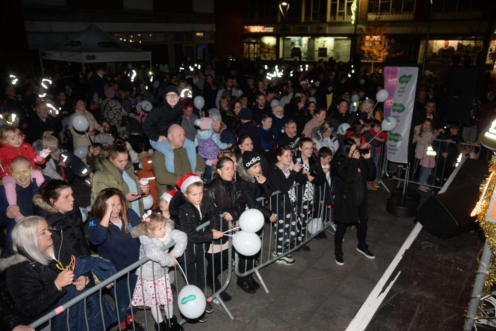 Spectators at the Christmas Lights switch-on in Strood on Friday evening. Picture: Chris Davey. (53201167)