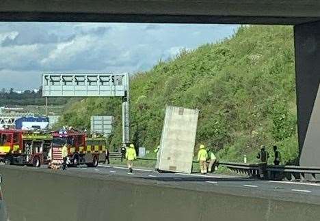 The trailer on its side on the M25 near the Dartford Bridge