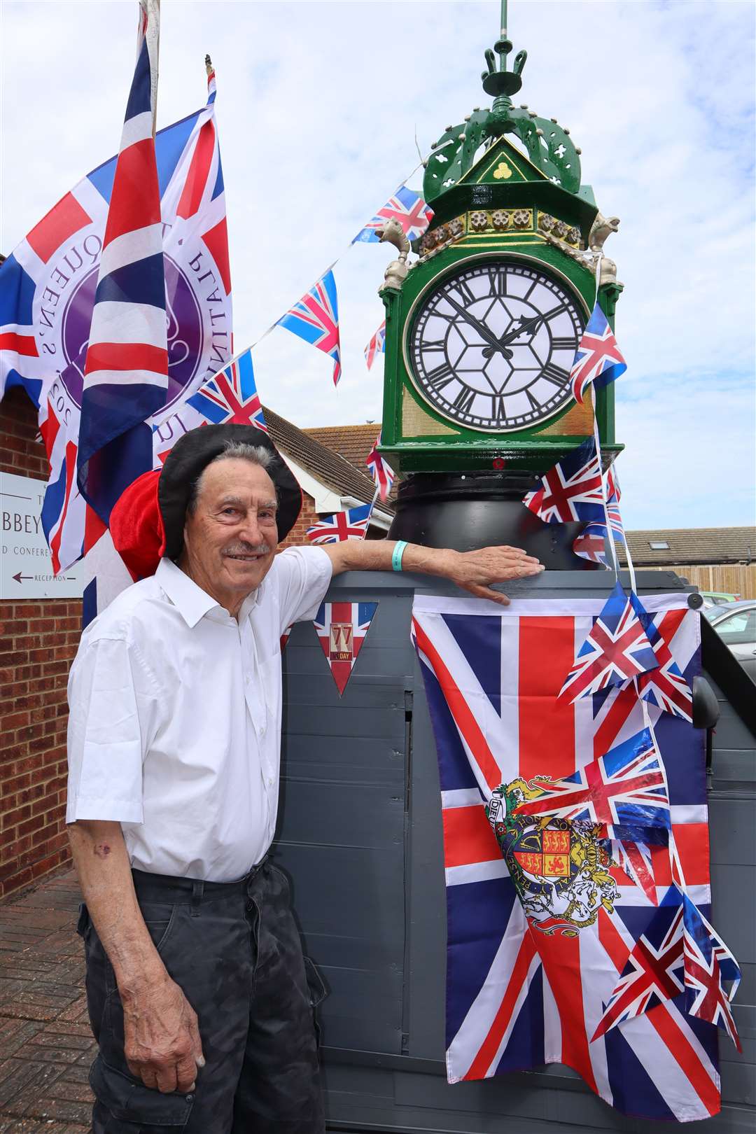 Veteran charity collector and 'inventor' Tim Bell has turned his mobility scooter into a replica of Sheerness clock tower. It made its debut at the Abbey Motel on Friday for the Rotary Club of Minster-on-Sea's Jubilee community awards. Picture: John Nurden