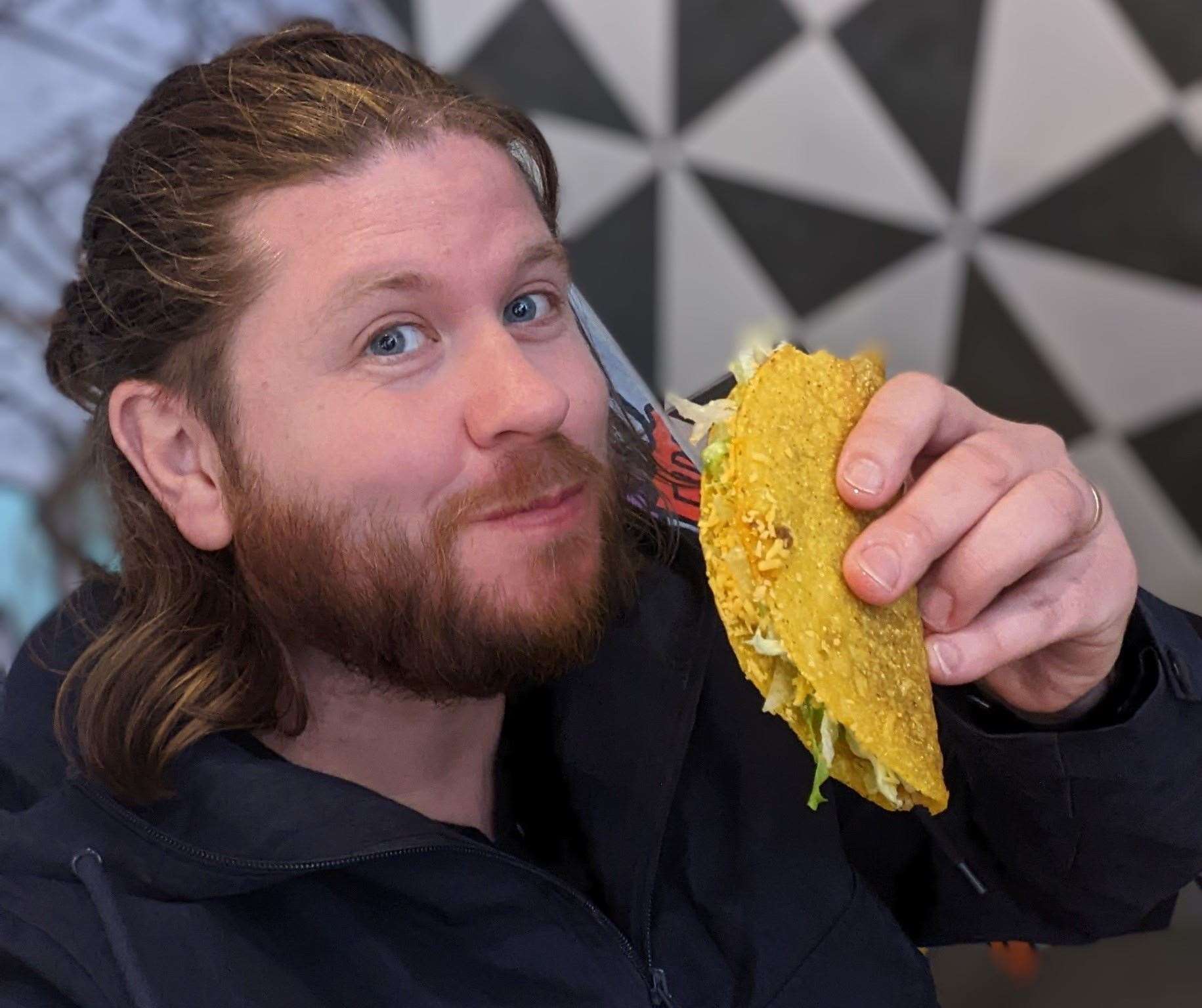 Reporter Rhys Griffiths tucks in to his Taco Bell meal in Folkestone