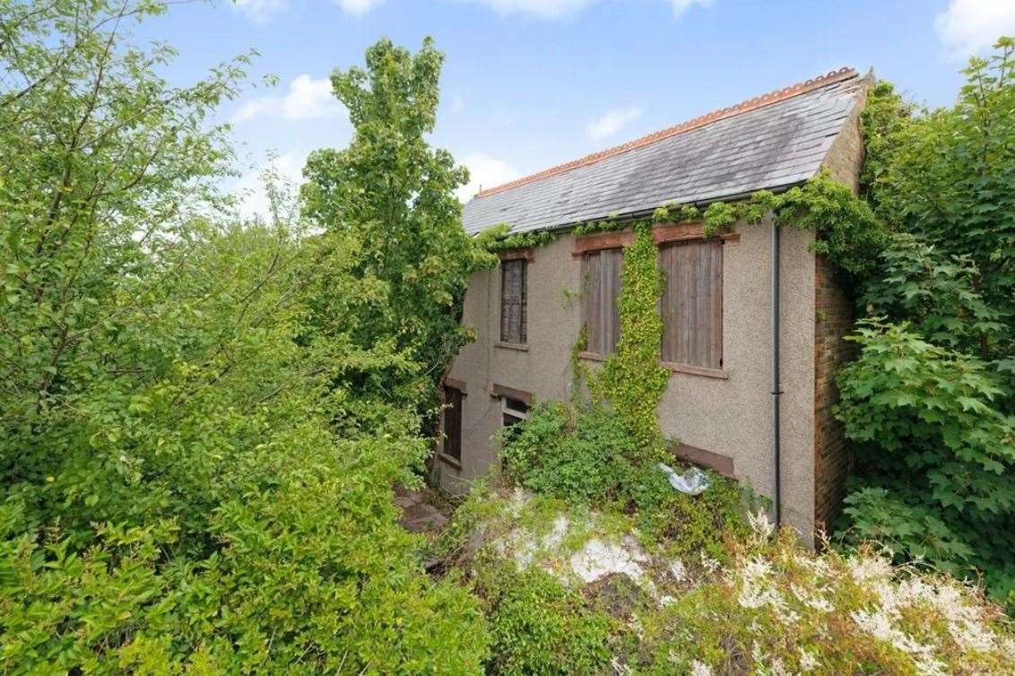 The windows may be boarded up - but this plot still commands a huge asking price. Picture: Zoopla