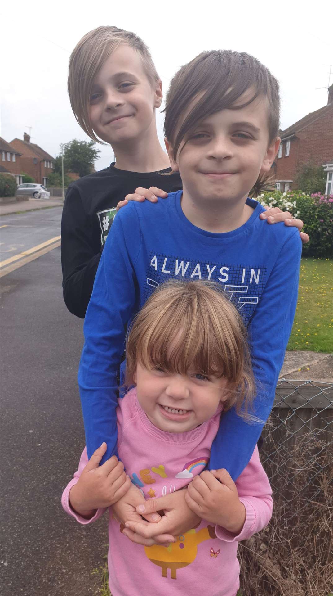 Herne Bay schoolboy Ethan Wells with younger brother Ryan, nine, and sister Amy, three
