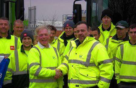 Butch, aka Barry Stanton, left, with Tony Collins and colleagues on his last day at the Biffa depot