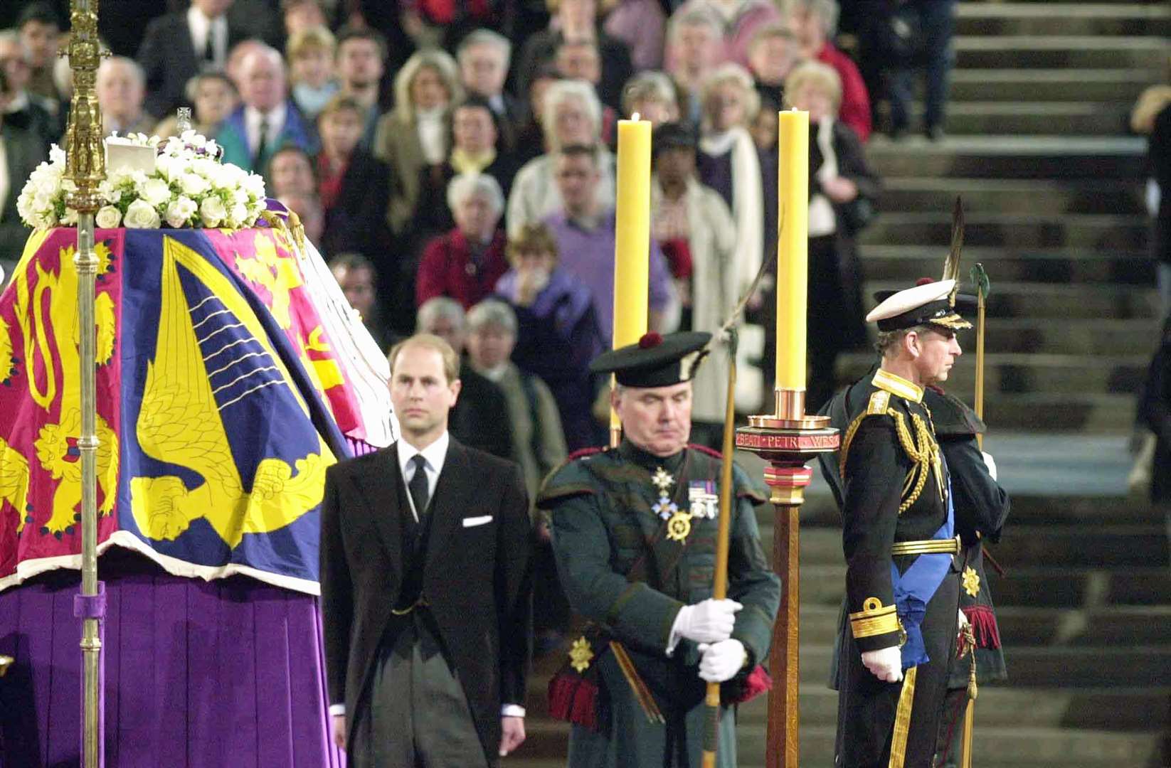 The Earl of Wessex and the Prince of Wales stand in front of the coffin of the Queen Mother in Westminster Hall (PA)