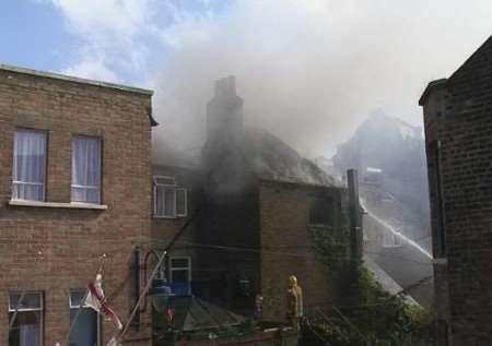 Firefighters tackling the blaze in Harbour Street, Ramsgate. Picture: MIKE PETT
